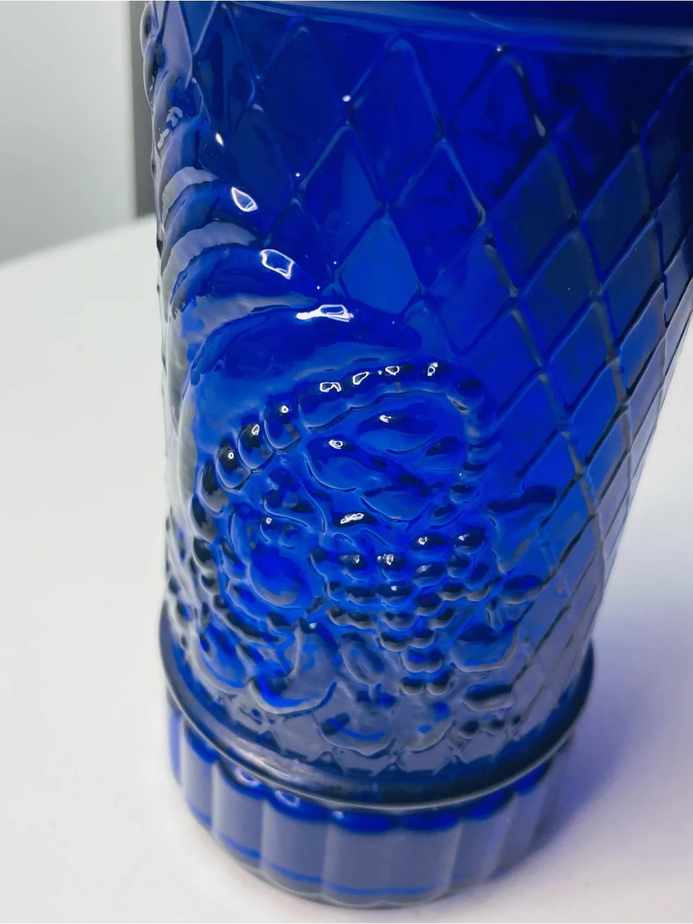 Vintage Colbalt blue glass bottle embossed cornacopia from Spain